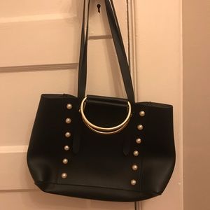 Trendy bag with metal top handle